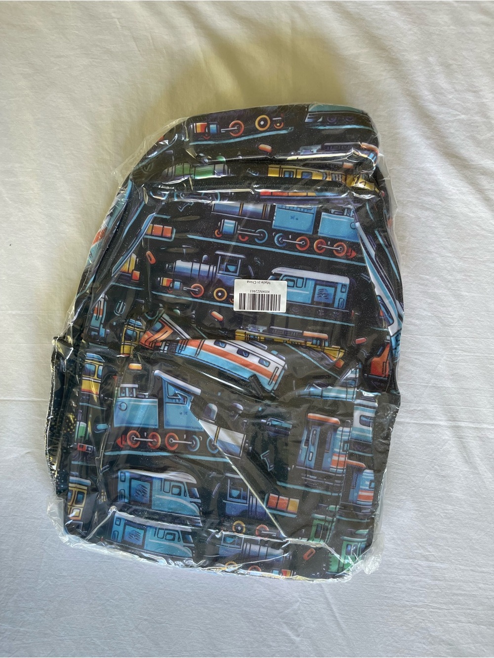 Kids Black Train-Print Backpack - Colorful Locomotive Design
